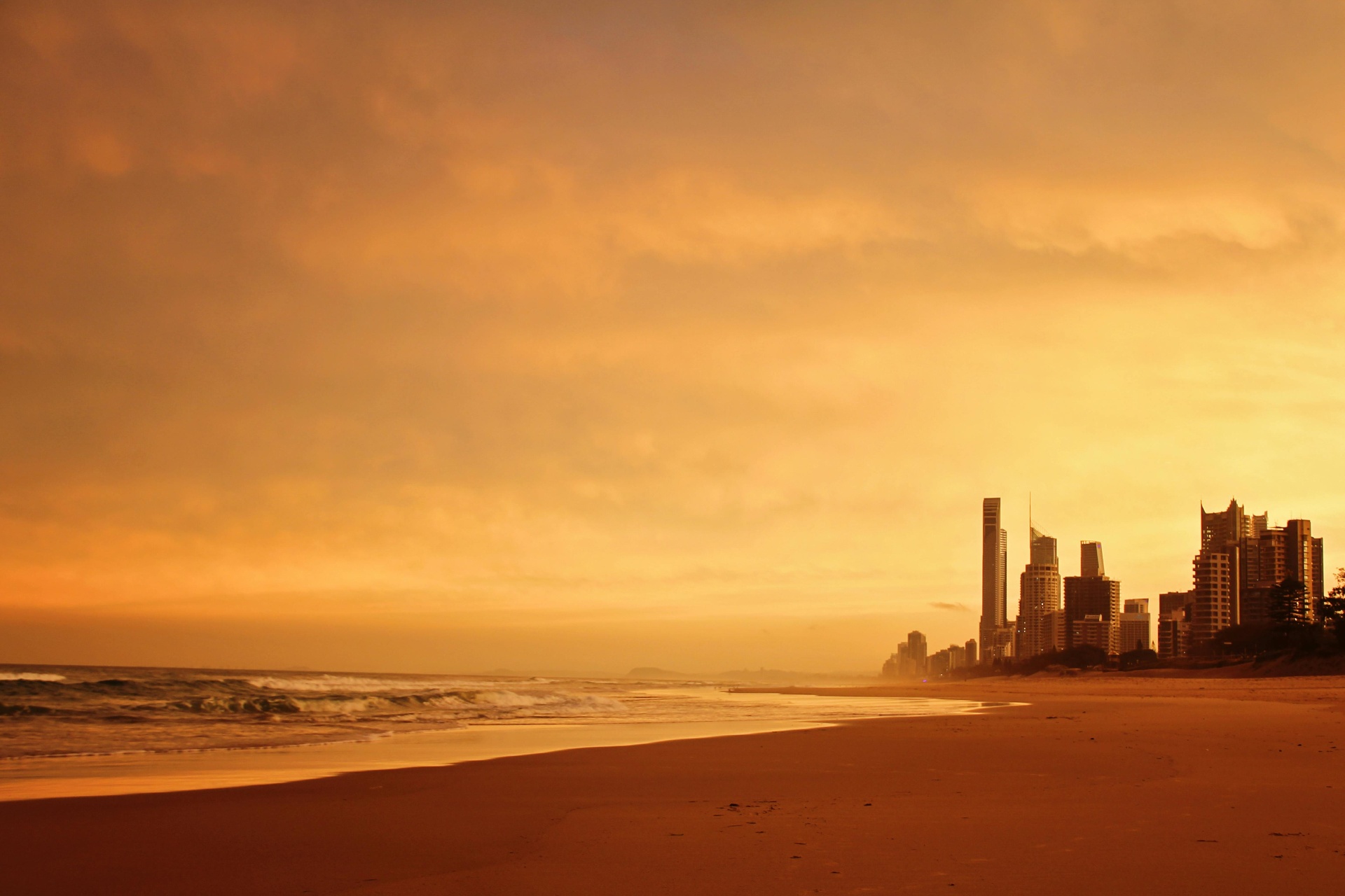 Aerial view of Gold Coast waterfront homes at sunset